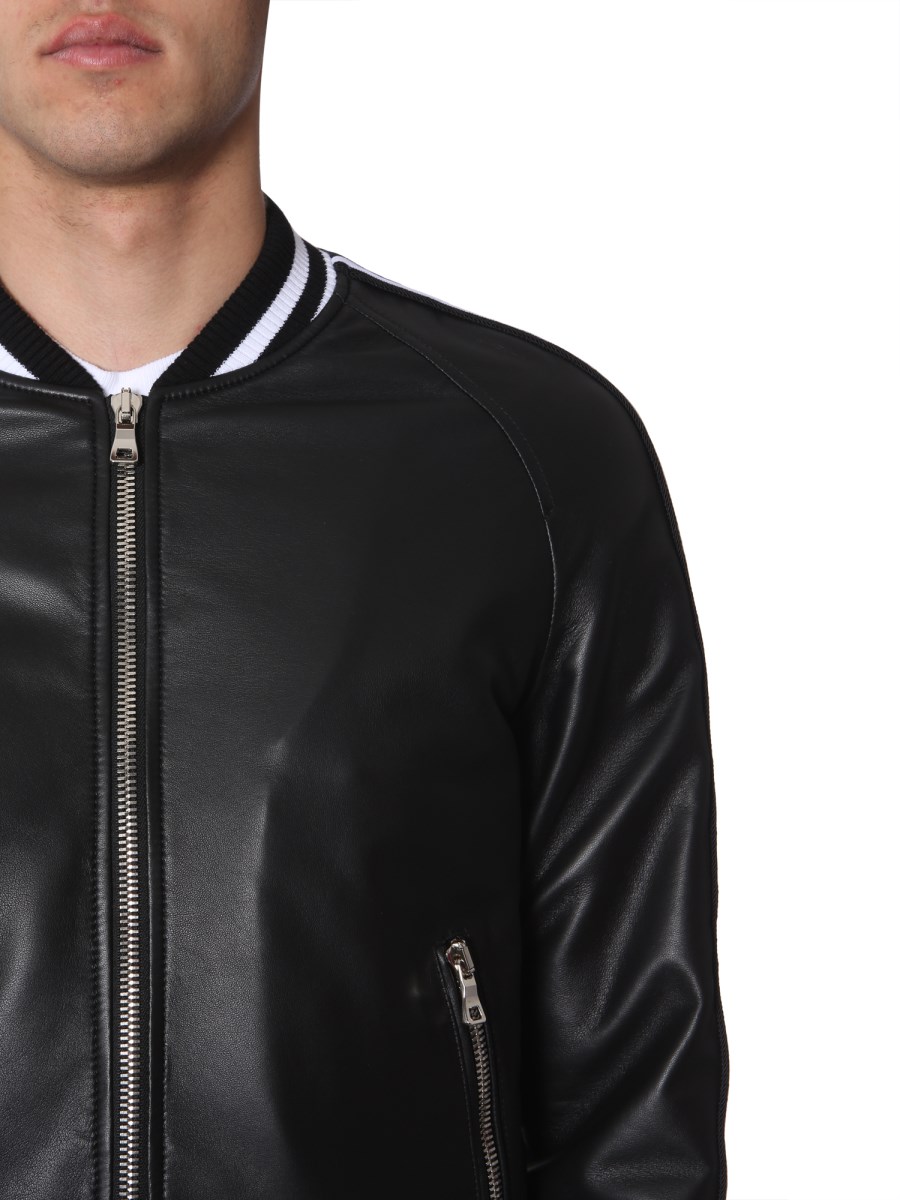 BALMAIN - LEATHER BOMBER WITH LOGO-PRINTED BANDS - Eleonora Bonucci