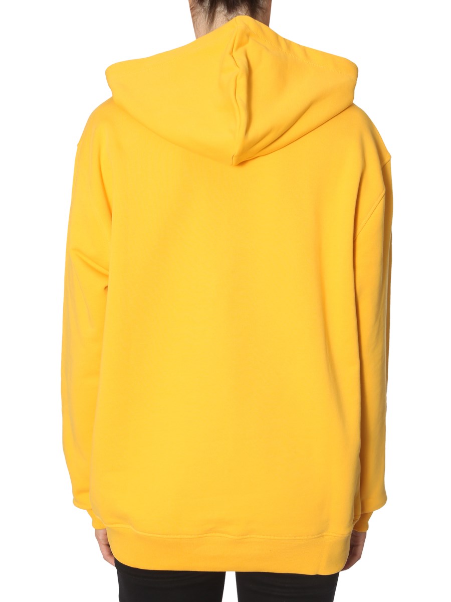 Moschino yellow hoodie best sale