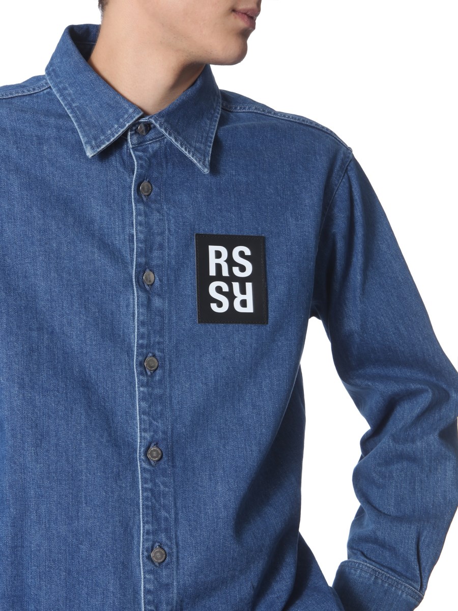 RAF SIMONS - SLIM FIT DENIM SHIRT WITH LOGO PATCH - Eleonora RAF SIMONS - SLIM FIT DENIM SHIRT WITH LOGO PATCH - Eleonora