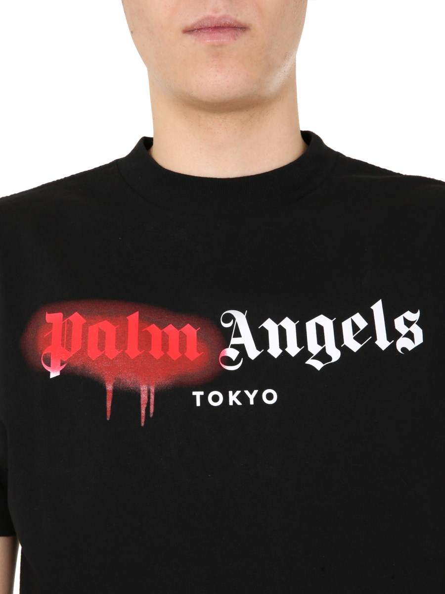 PALM ANGELS - LOS ANGELES SPRAYED LOGO PRINT HOODIE - Eleonora Bonucci