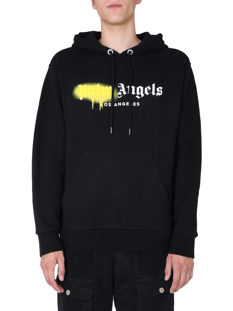 PALM ANGELS - LOS ANGELES SPRAYED LOGO PRINT HOODIE - Eleonora Bonucci