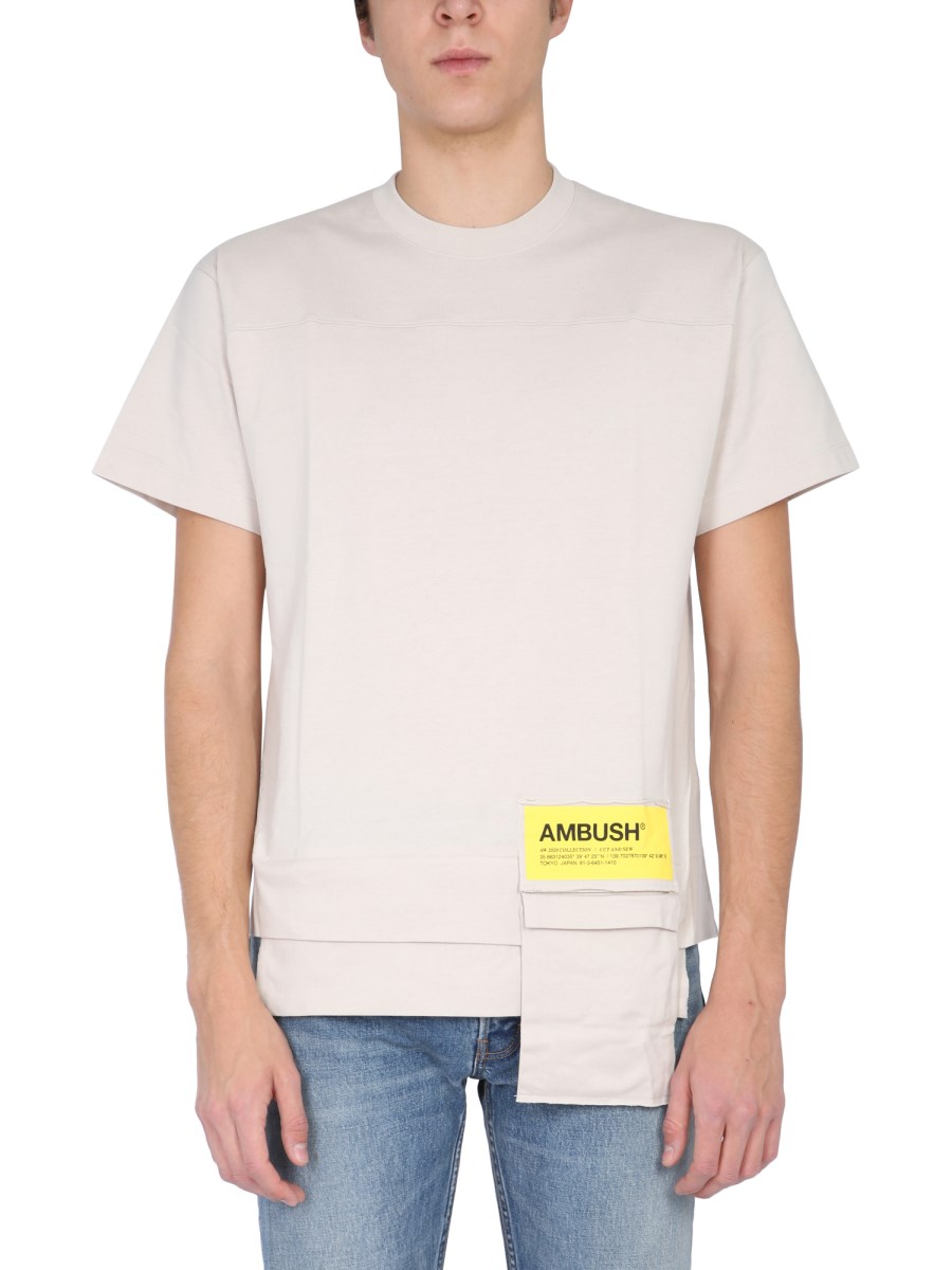 AMBUSH T-SHIRT GIROCOLLO IN COTONE CON TASCA