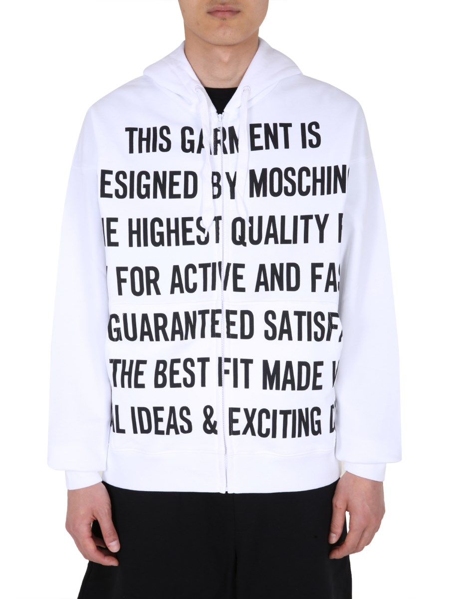 MOSCHINO FELPA IN COTONE CON ZIP E STAMPA SLOGAN