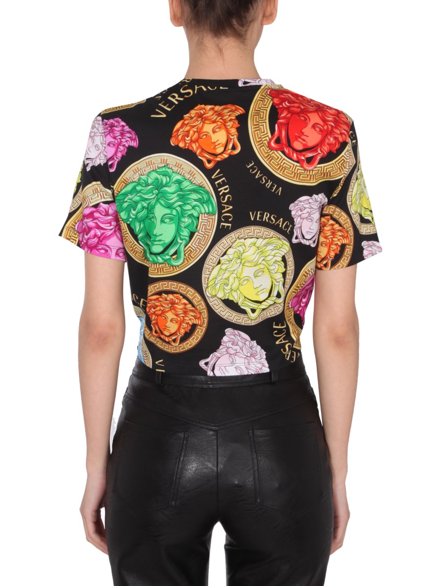 VERSACE - CROPPED T-SHIRT WITH SAFETY PIN AND MEDUSA VERSACE - CROPPED T-SHIRT WITH SAFETY PIN AND MEDUSA