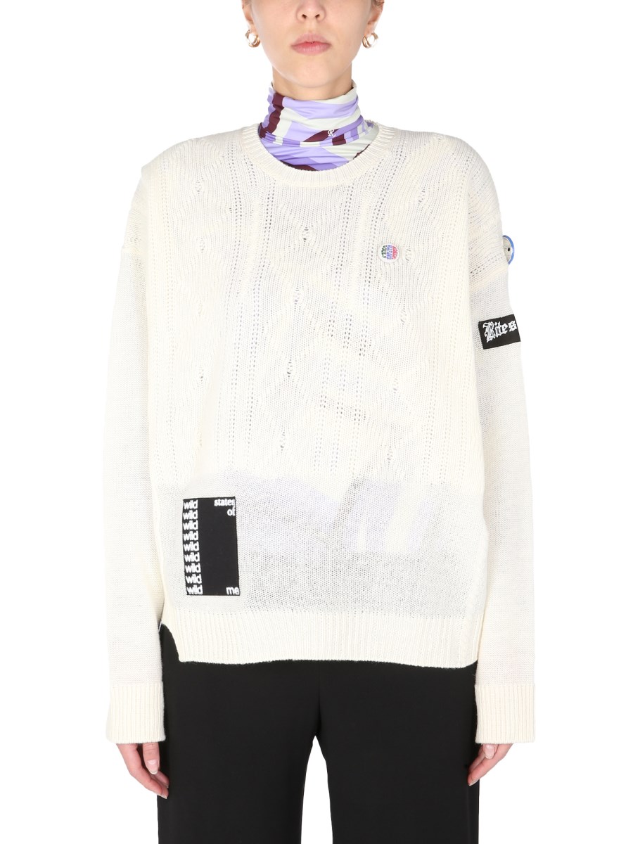 RAF SIMONS - CREW NECK MERINO WOOL SWEATER WITH PIN - Eleonora Bonucci