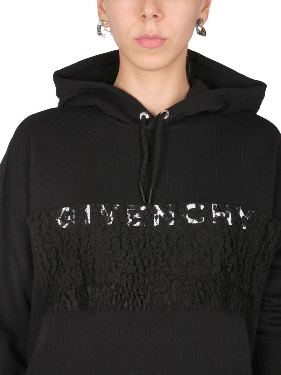 Givenchy Felpa con zip e capppuccio H05057 main image 0