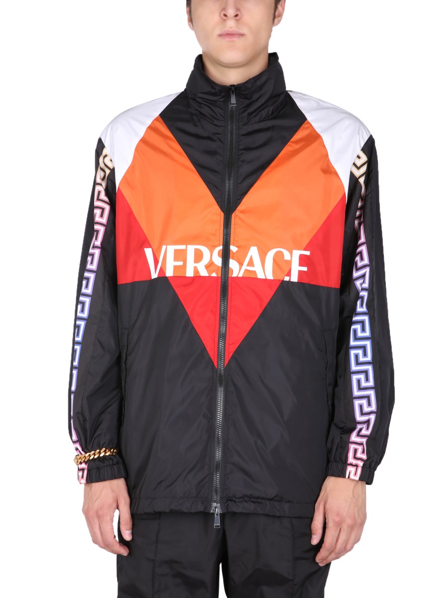 VERSACE - NYLON JACKET WITH LOGO AND GREEK PATTERN - Eleonora Bonucci