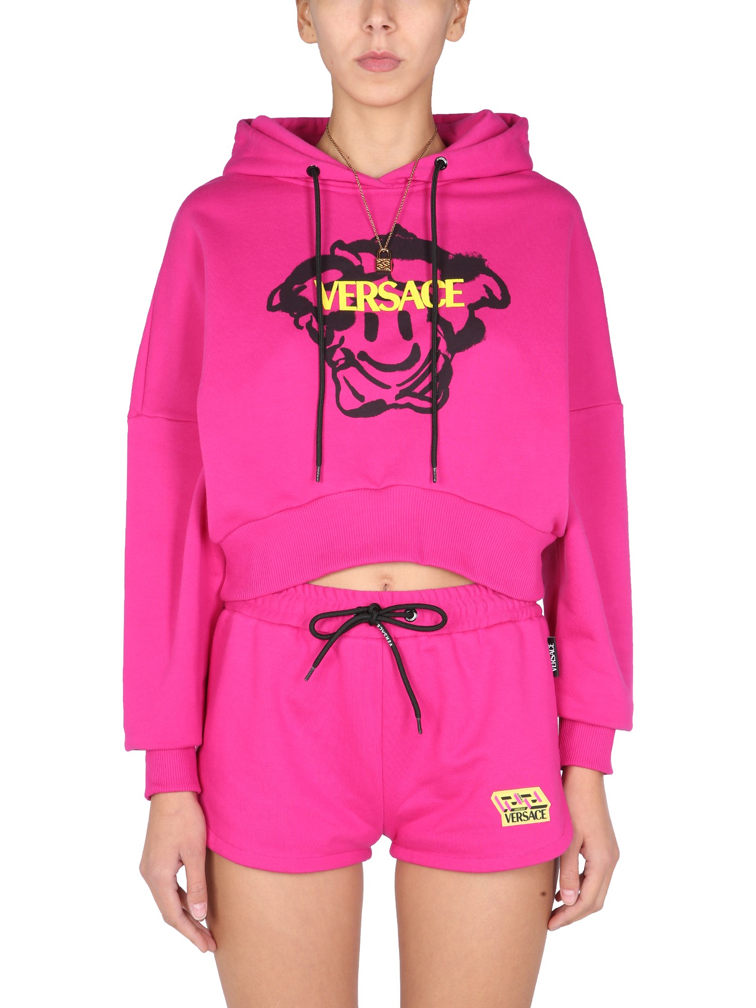 versace sweatshirt with smile medusa motif