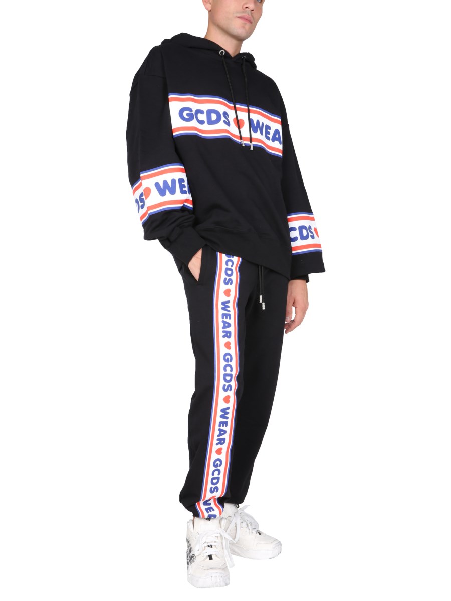 PANTALONE JOGGING CON BANDA LOGO CUTE TAPE