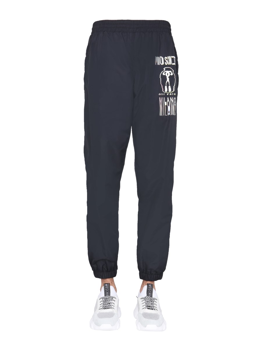 MOSCHINO PANTALONE JOGGING IN NYLON CON GRAFICA EFFETTO GLITCH