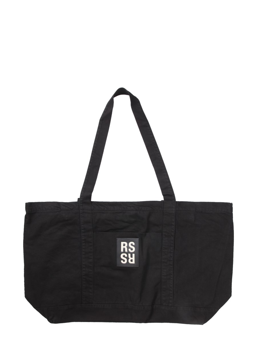 RAF SIMONS - OVERSIZE DENIM TOTE BAG WITH LOGO PATCH - Eleonora