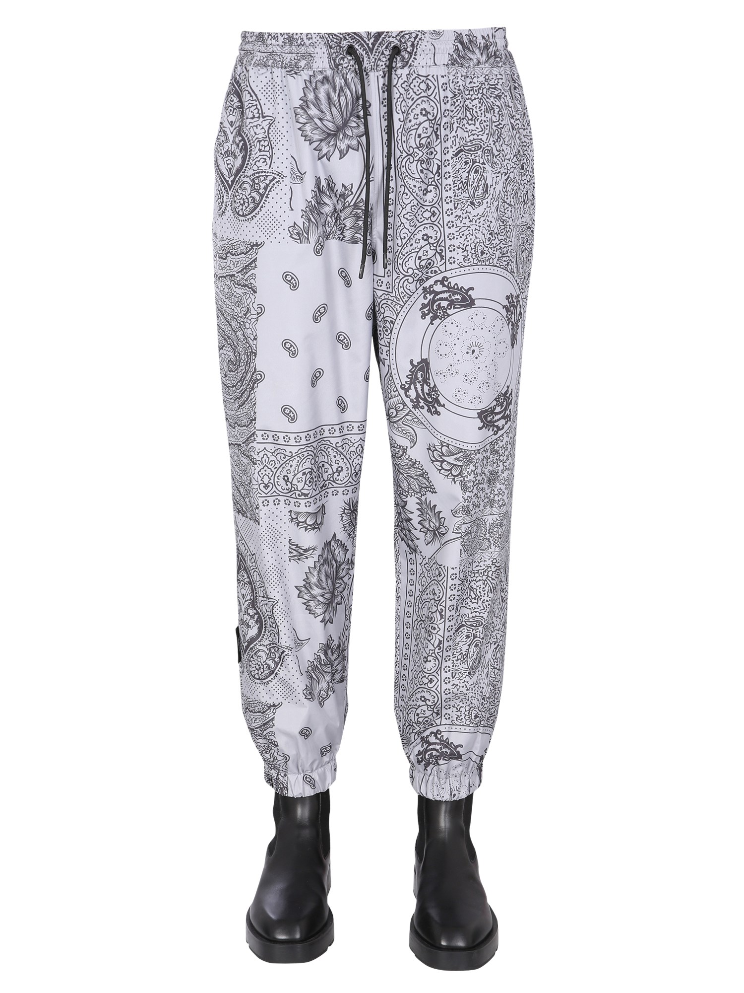 msgm jogging pants with all-over paisley patchwork print