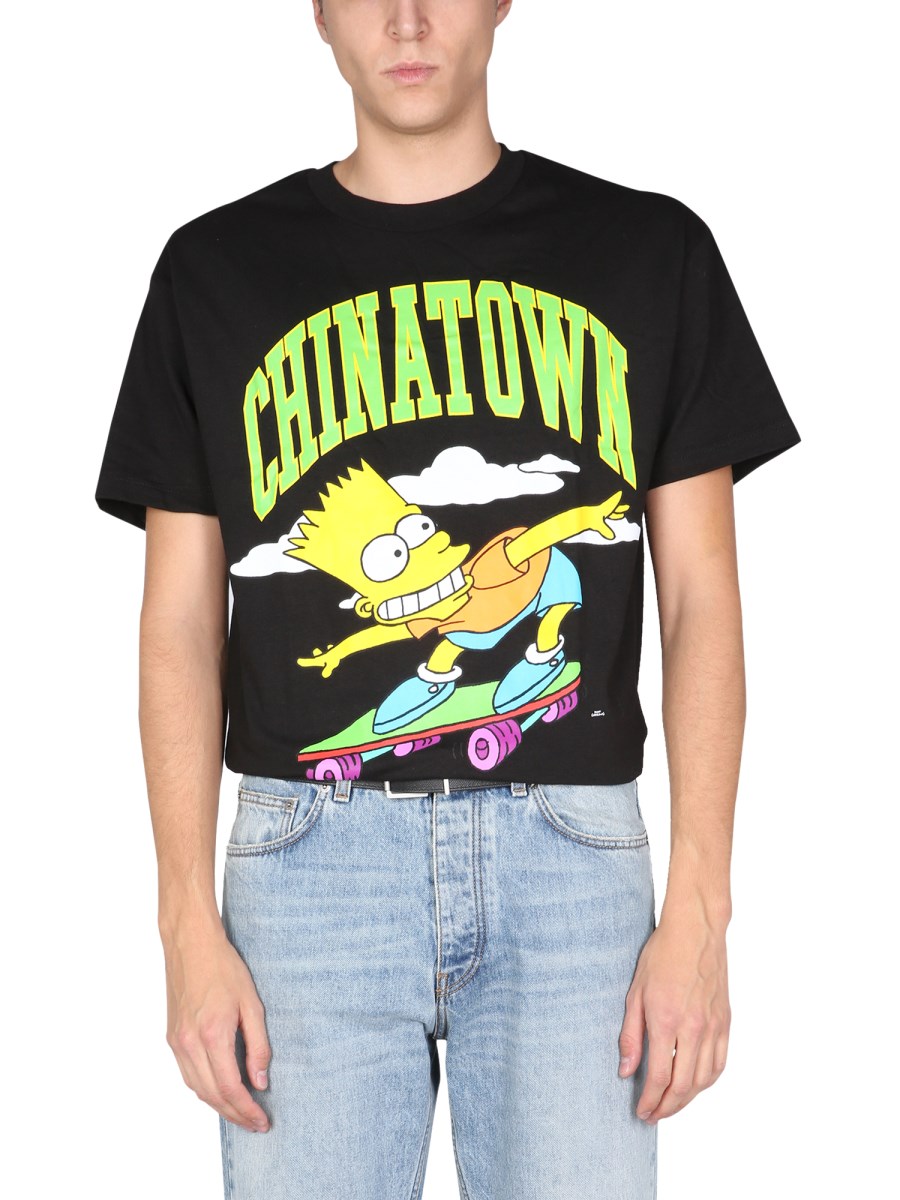 CHINATOWN MARKET X THE SIMPSONS T-SHIRT COWABUNGA IN JERSEY DI COTONE