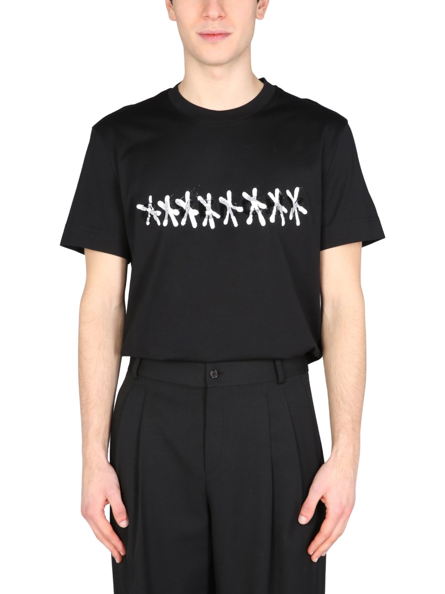 GIVENCHY - COTTON JERSEY T-SHIRT WITH GRAFFITI PRINT - Eleonora Bonucci