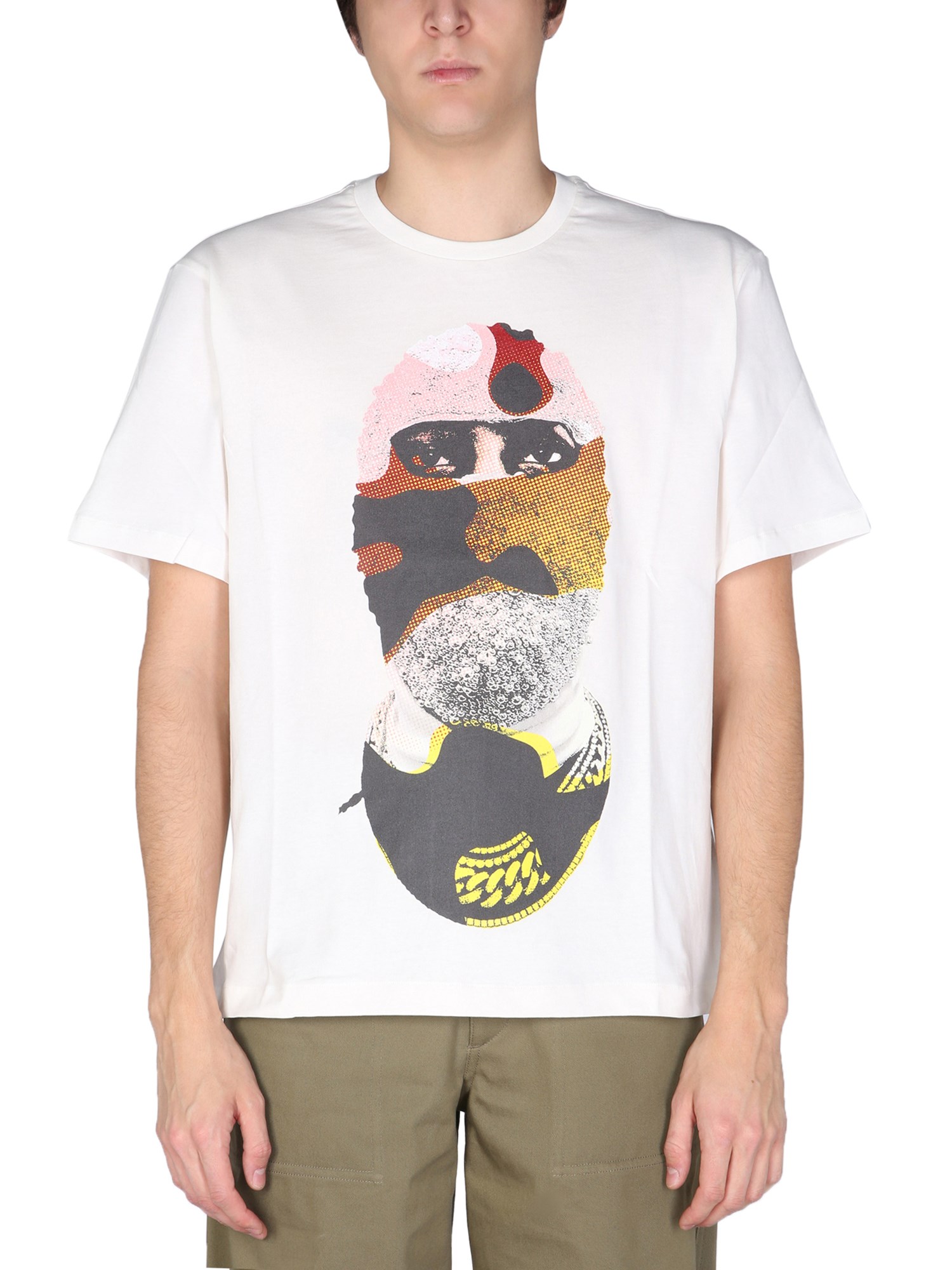 ih nom uh nit t-shirt with "mask on yellow camouflage" print