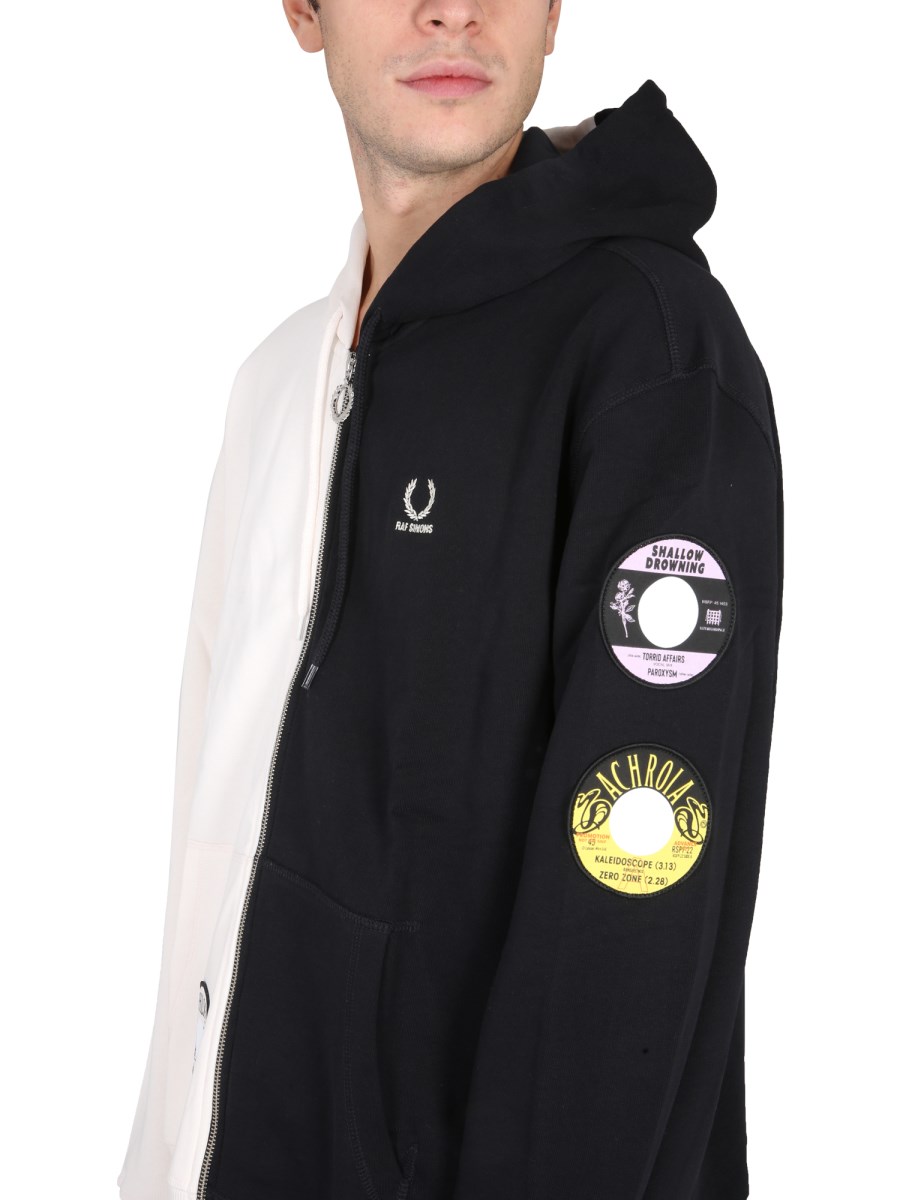FRED PERRY X RAF SIMONS - TWO-TONE COTTON HOODIE - Eleonora FRED PERRY X RAF SIMONS - TWO-TONE COTTON HOODIE - Eleonora