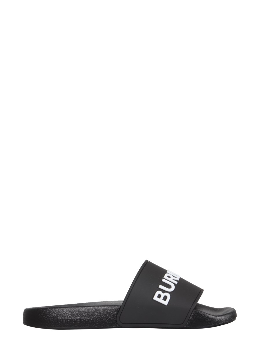 BURBERRY RUBBER SLIDE SANDALS WITH LOGO Eleonora Bonucci