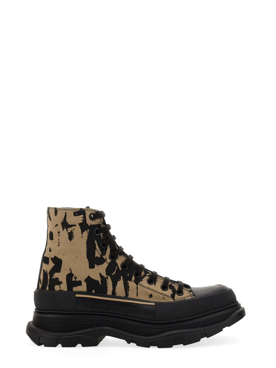 ALEXANDER McQUEEN STIVALETTI TREAD SLICK CON LOGO GRAFFITI