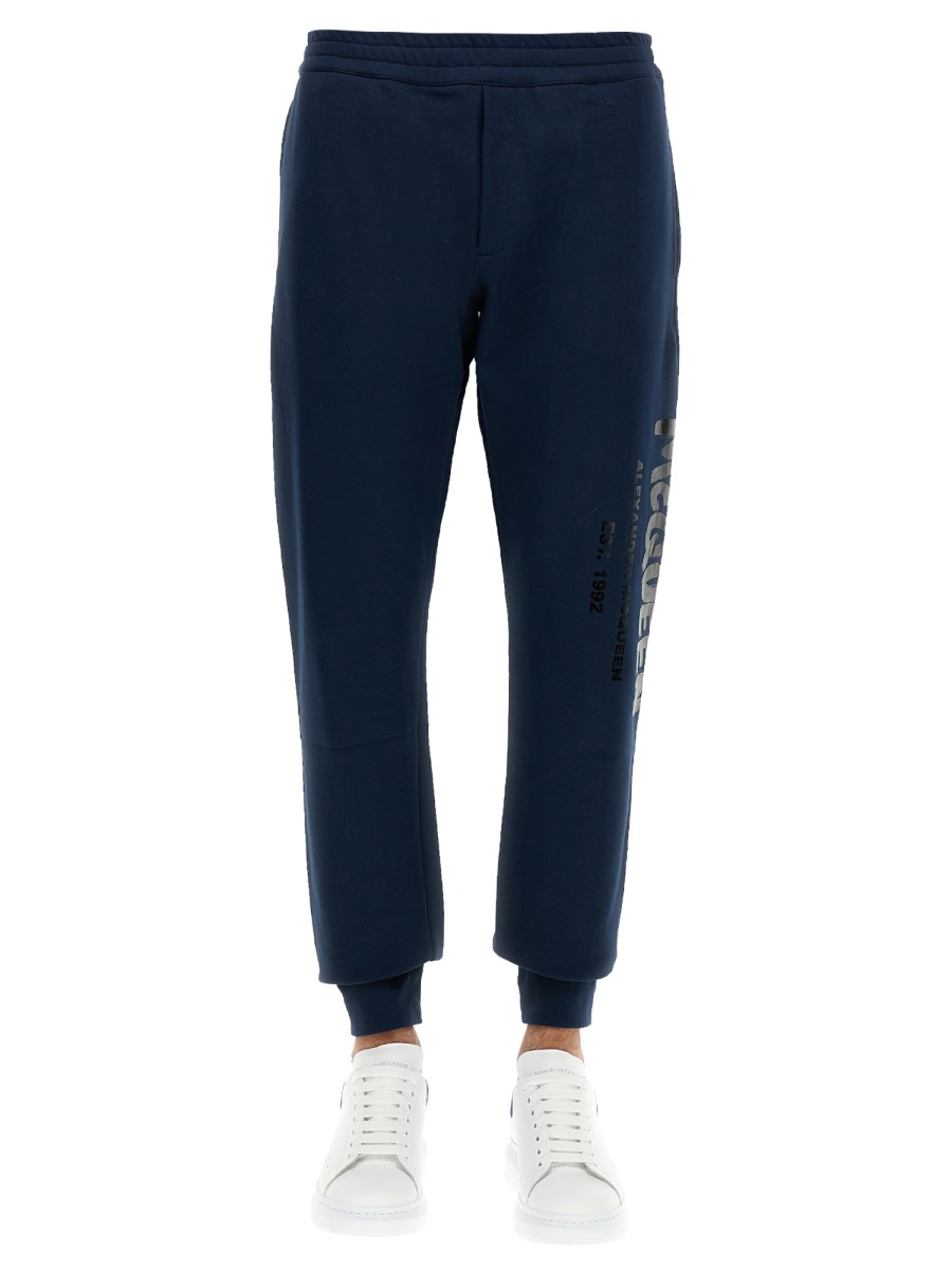 ALEXANDER McQUEEN PANTALONE JOGGING IN COTONE CON LOGO GRAFFITI