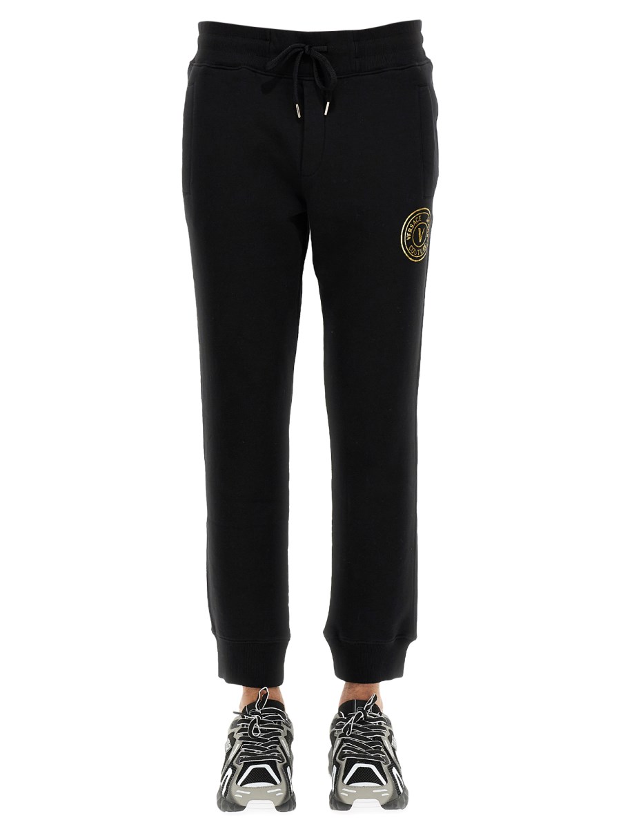 VERSACE JEANS COUTURE - COTTON SPORT PANTS WITH V-EMBLEM - Eleonora Bonucci