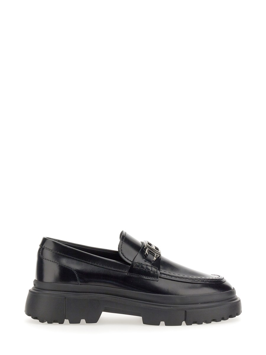 MOCASSINO CON PLACCA LOGO