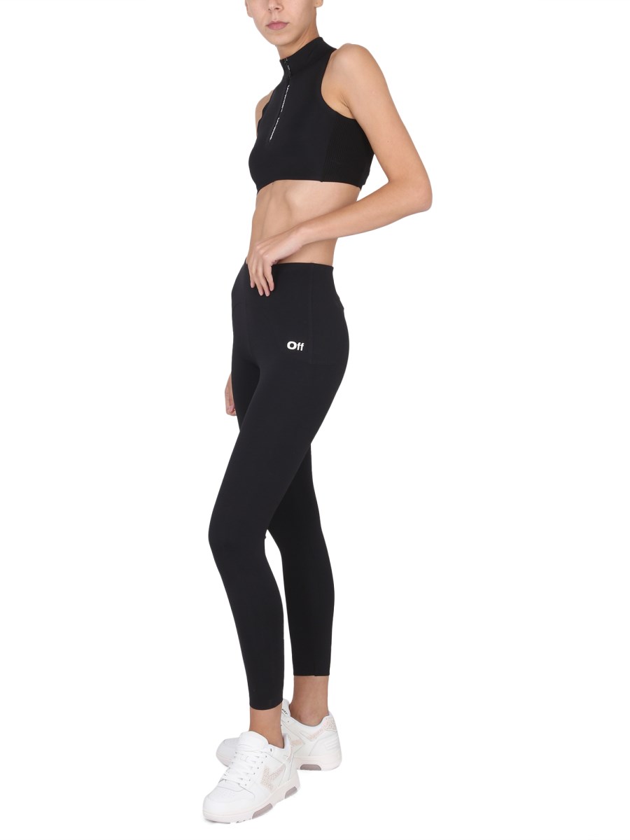 CROP TOP CON ZIP