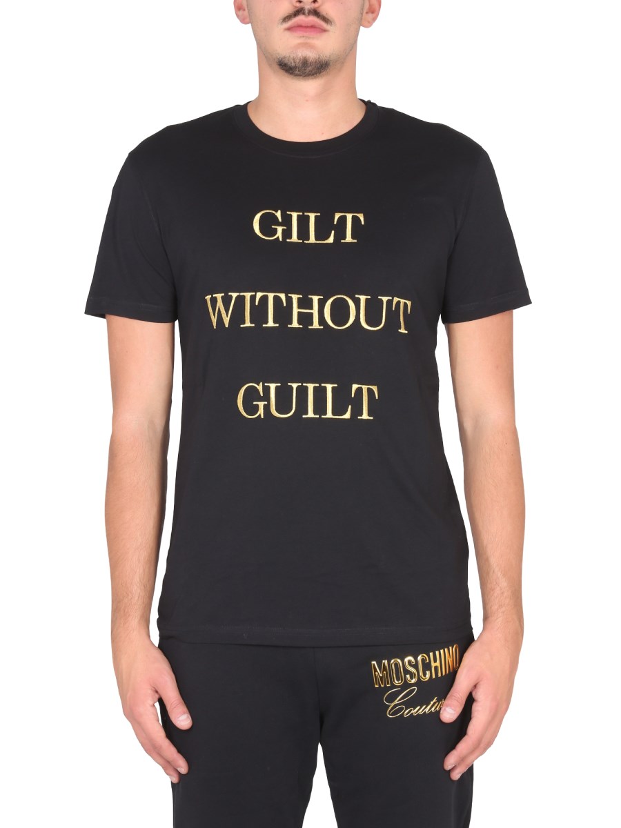 MOSCHINO T-SHIRT "GUILT WITHOUT GUILT" IN JERSEY DI COTONE