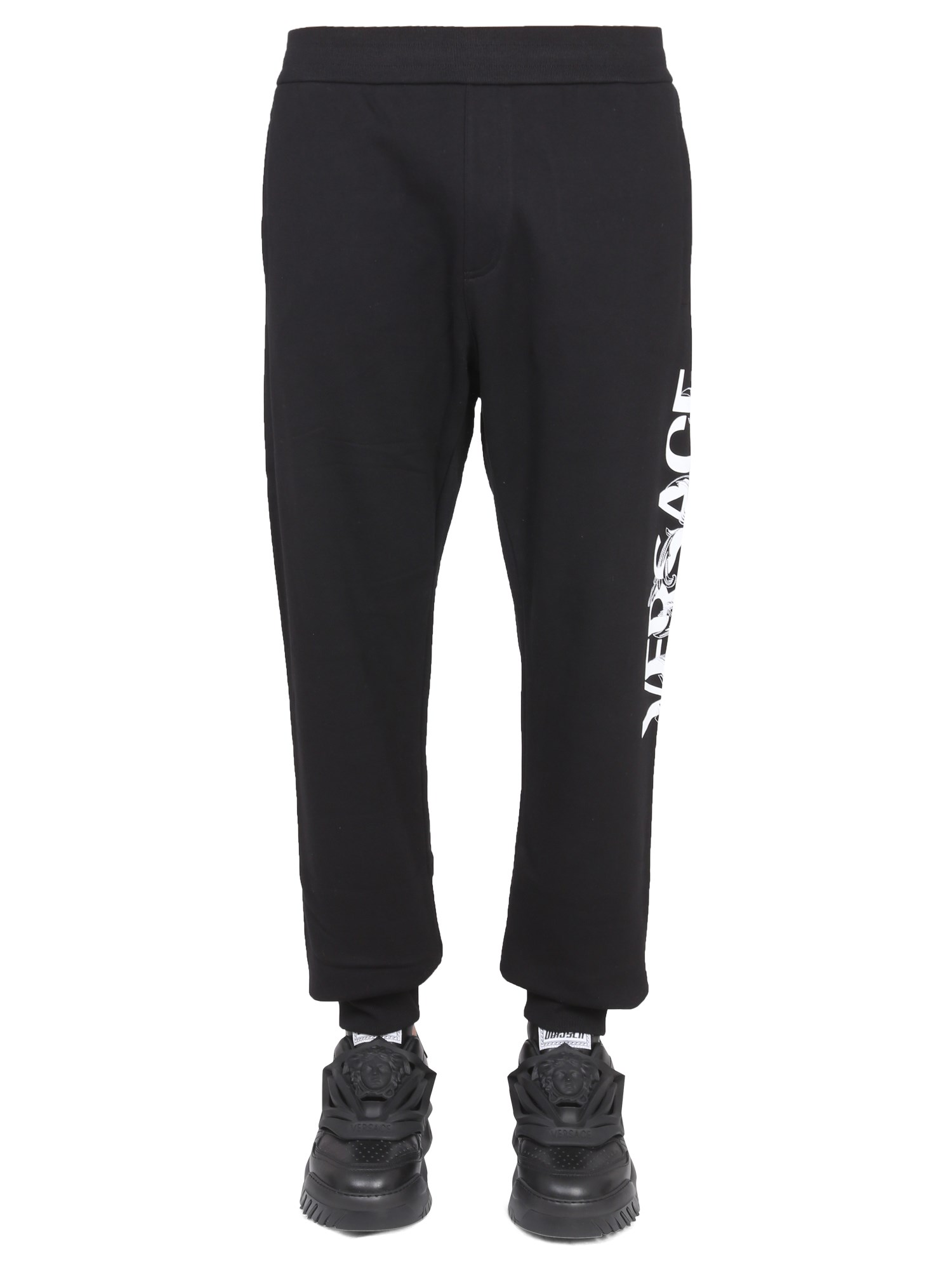 Shop Versace Jogging Pants With Logo In Black