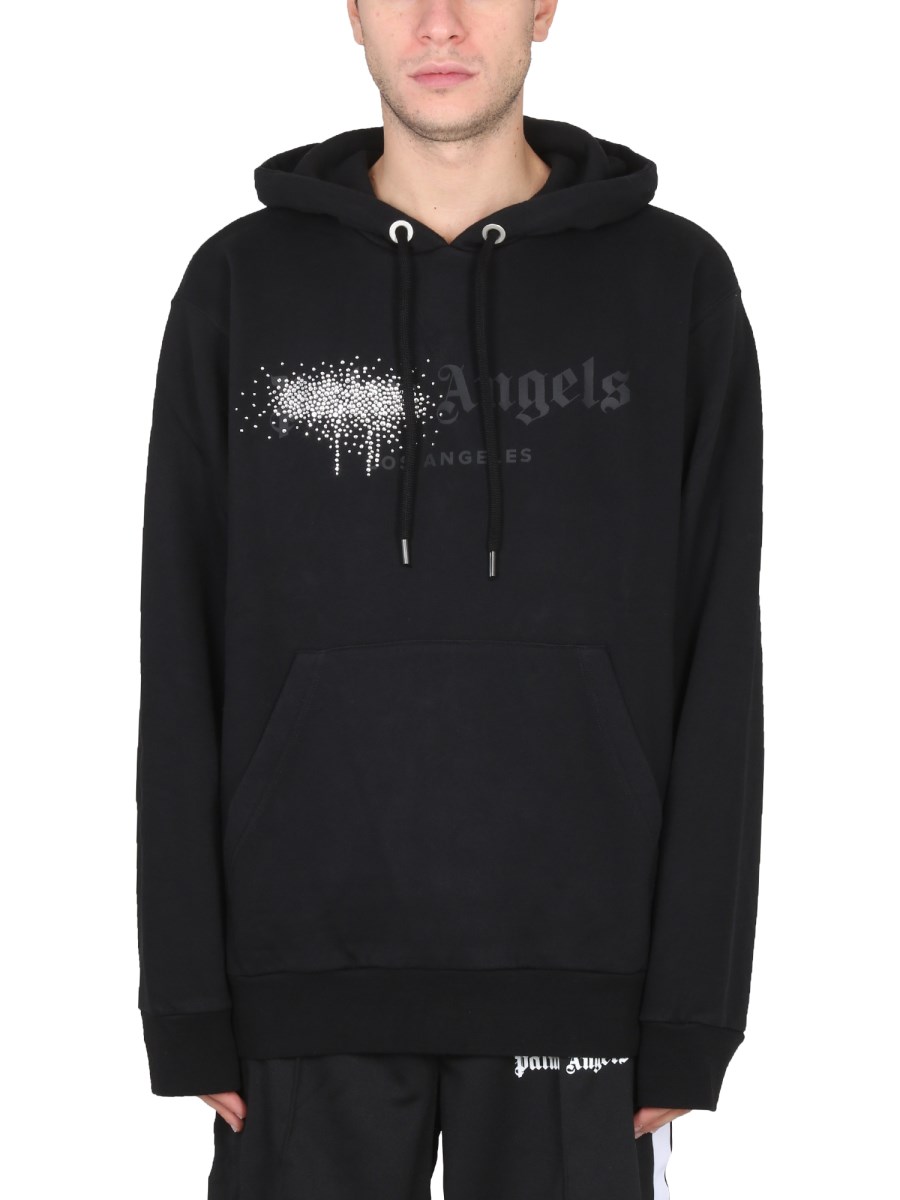 PALM ANGELS - LOS ANGELES SPRAYED LOGO PRINT HOODIE - Eleonora Bonucci