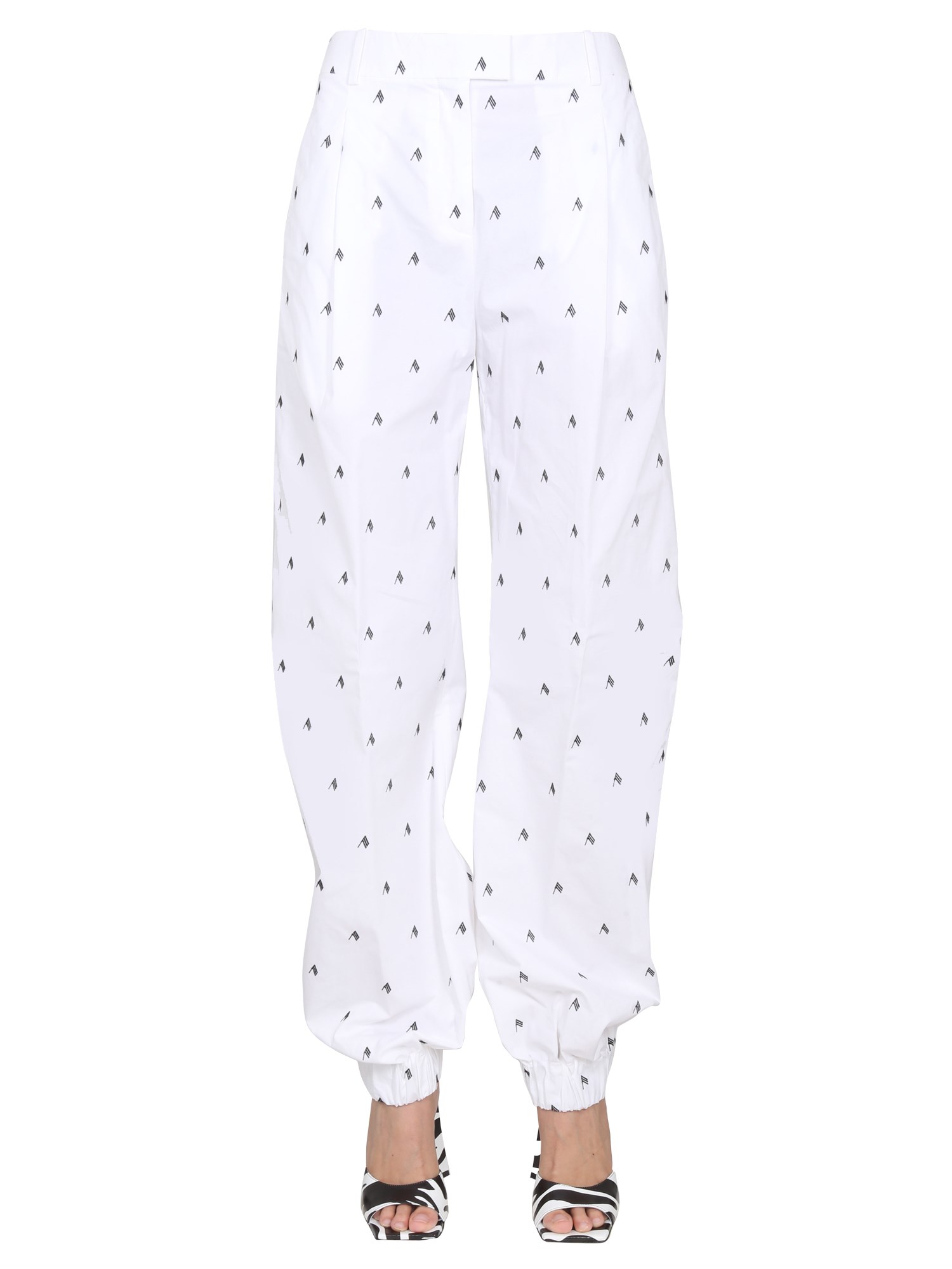 Shop Attico All Over Logo Pants In White