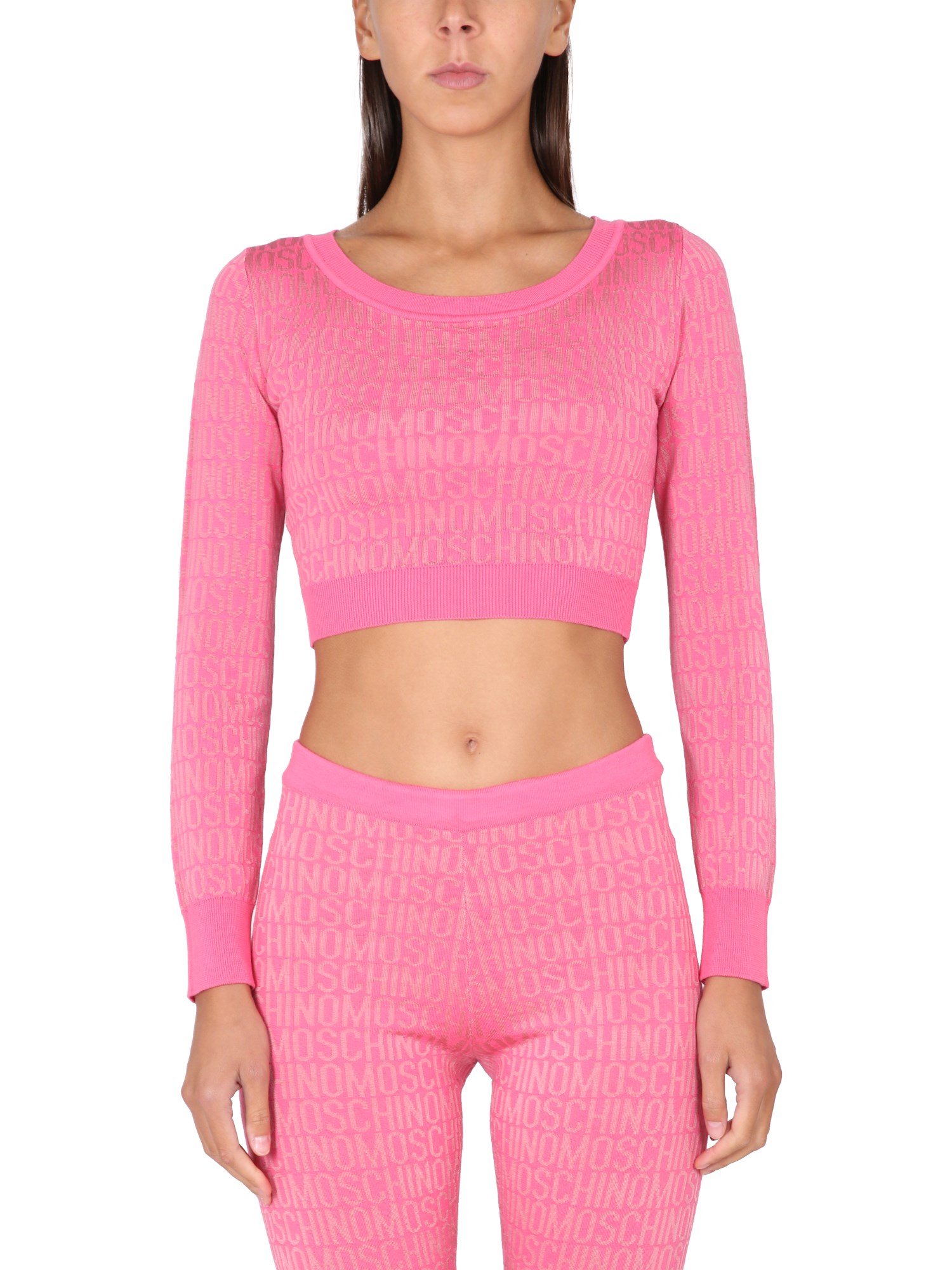 Moschino Cropped Pullover With Allover Logo Pattern In Pink