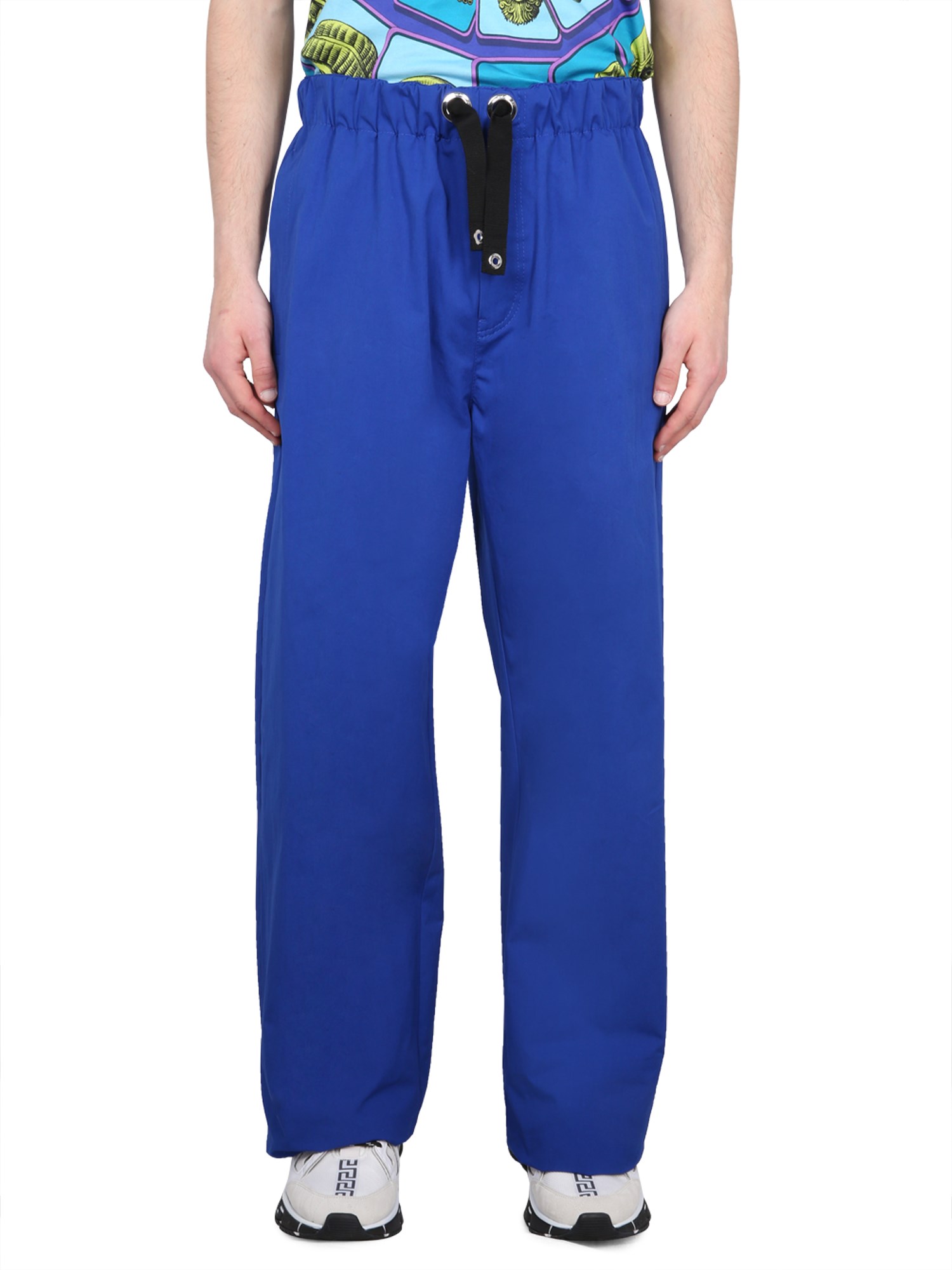 Shop Versace Drawstring Pants In Blue