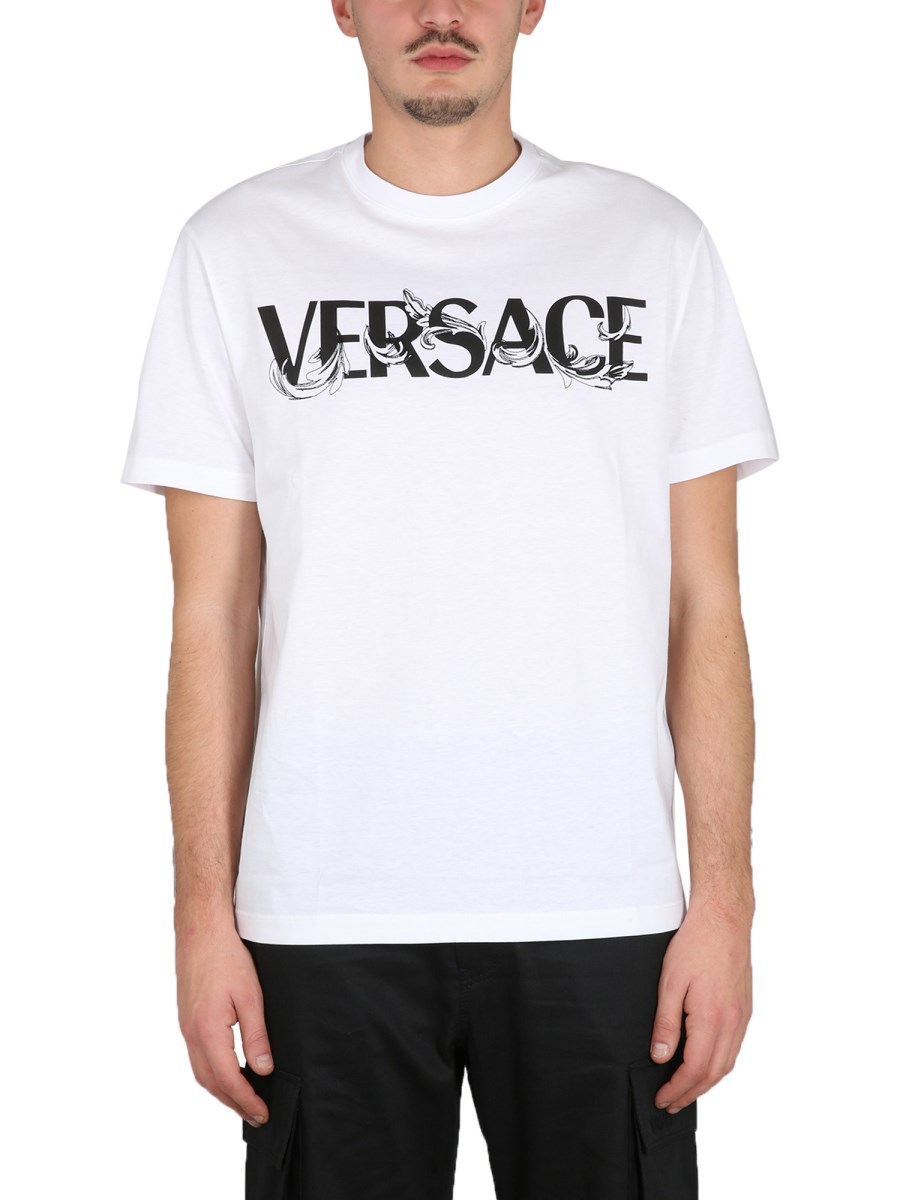 VERSACE - COTTON JERSEY BAROQUE LOGO T-SHIRT - Eleonora Bonucci