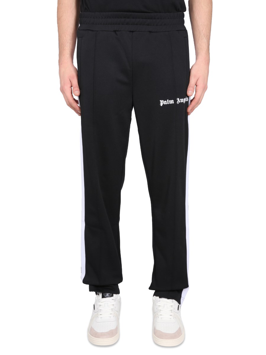 PALM ANGELS - JOGGING PANTS IN TECHNICAL FABRIC WITH LETTERING LOGO ...