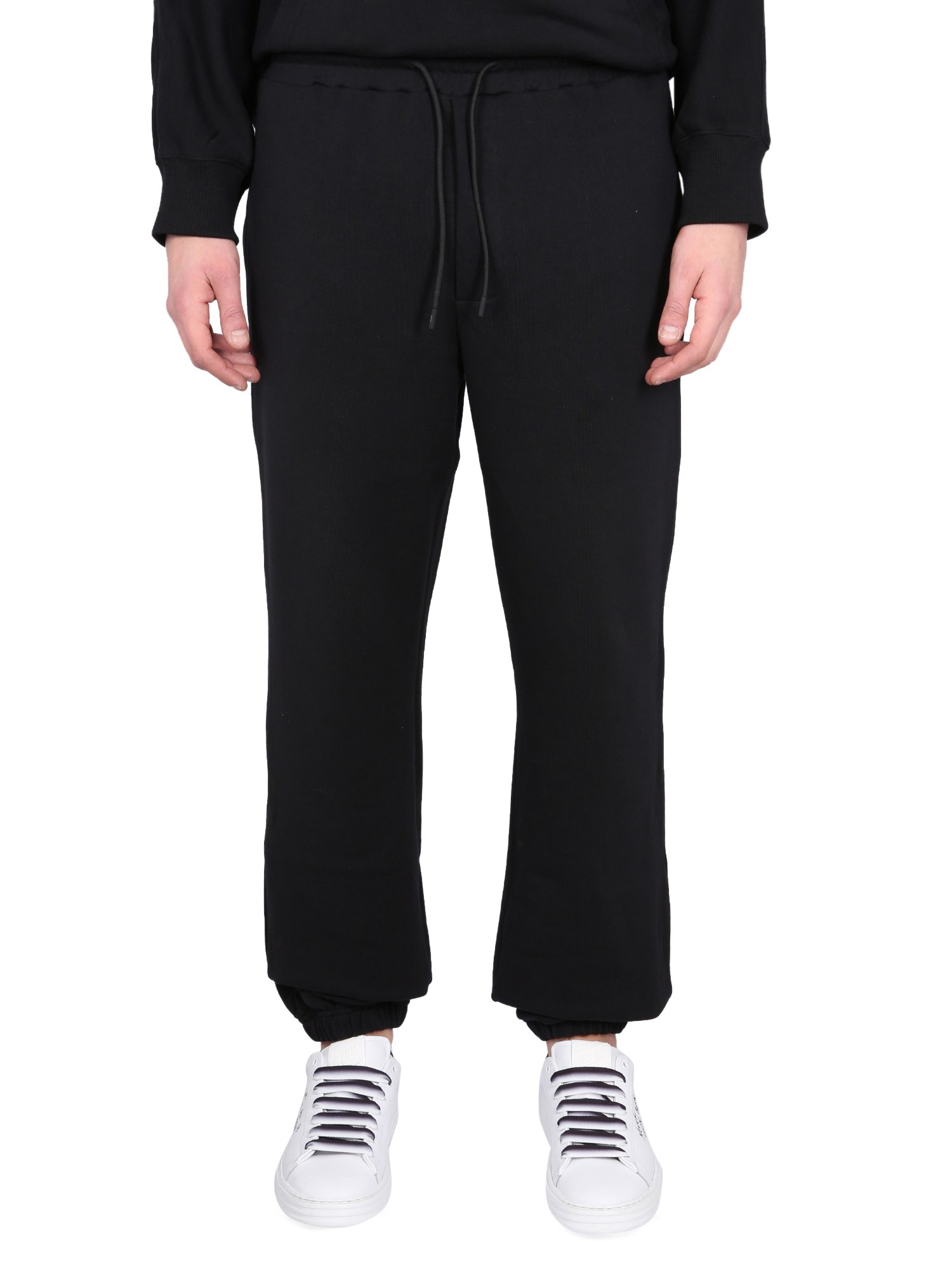 Shop Msgm Jogging Pants With Maxi Logo In Black