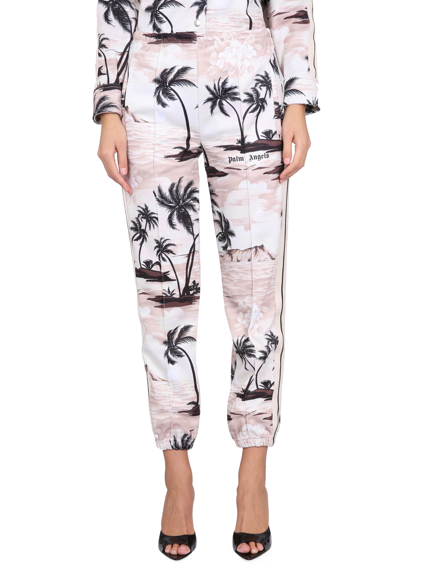 Shop Palm Angels Island Print Pants In Beige