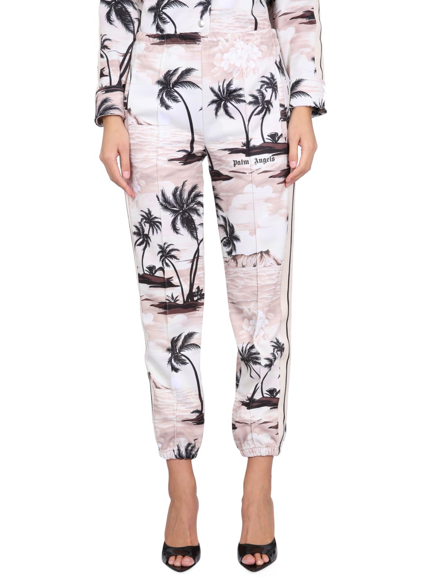 PALM ANGELS PANTALONE CON STAMPA ISLAND IN TESSUTO TECNICO