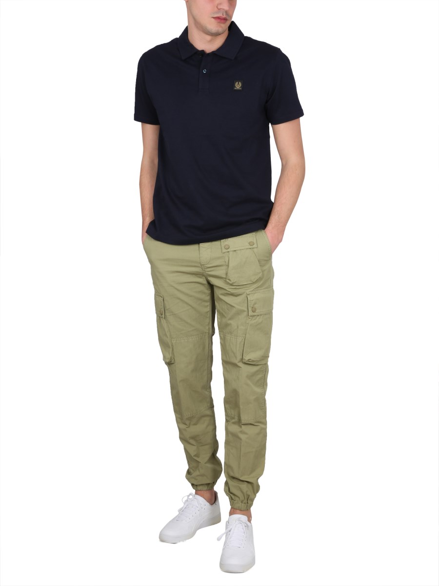 POLO CON PATCH LOGO