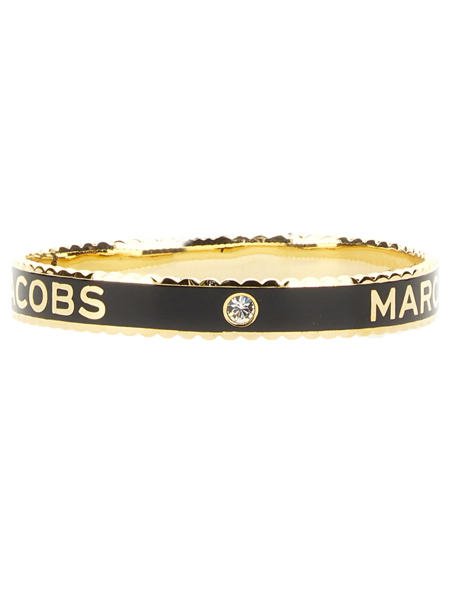 MARC JACOBS BRACCIALE RIGIDO A MEDAGLIONE PLACCATO CON BORDO SMERLATO