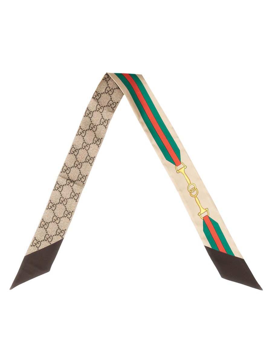 スカーフ Gucci Fiocco In Seta Stampa Morsetto Incrocio Gg E Web GUCCI - FIOCCO IN SETA CON STAMPA MORSETTO CON INCROCIO GG E