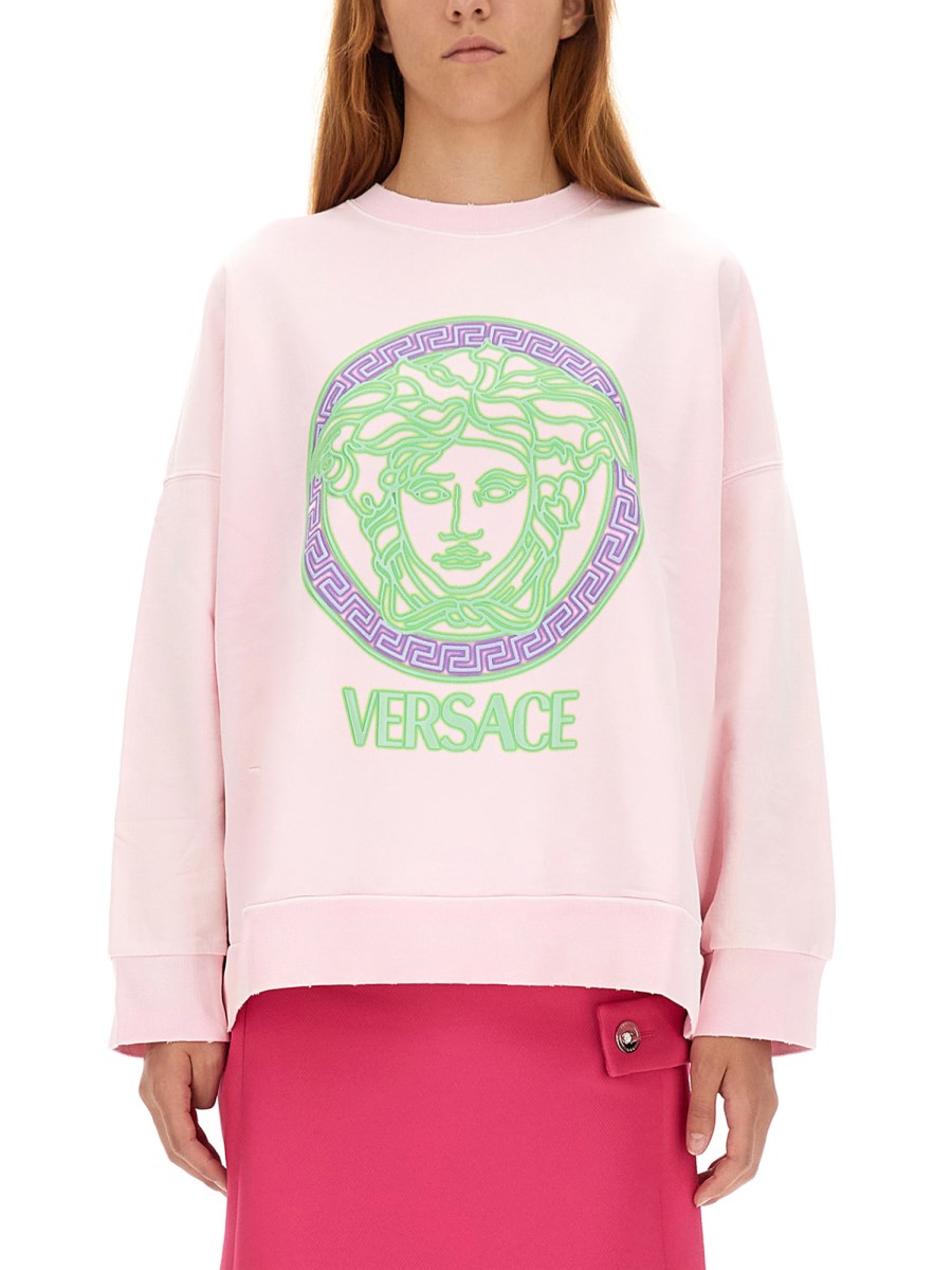 VERSACE SWEATSHIRT WITH WORN LOOK AND MEDUSA LOGO Eleonora Bonucci