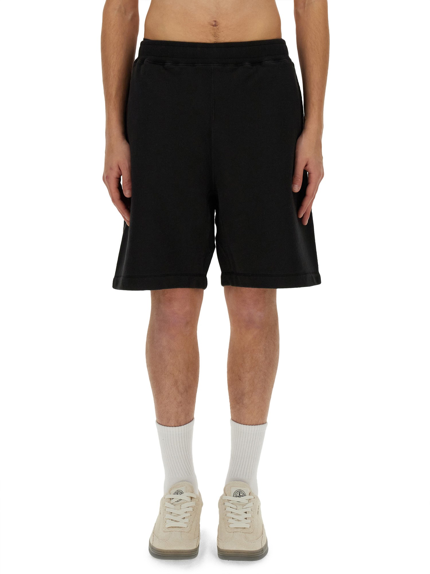 Shop Stone Island Sweat Shorts. In Black