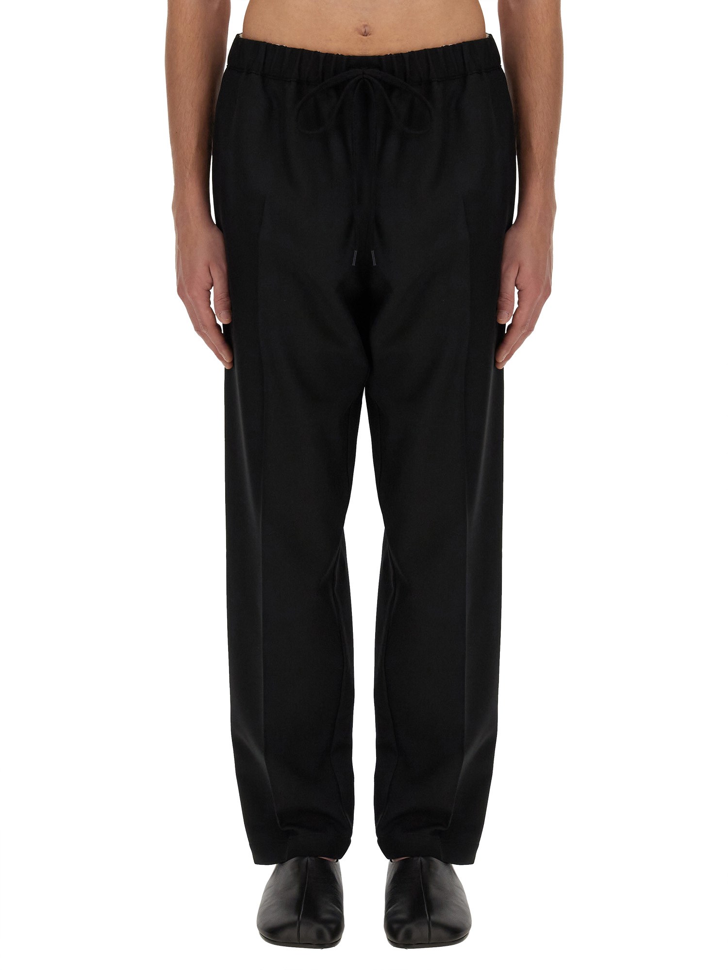 Shop Mm6 Maison Margiela Pants With Tapered Leg In Black