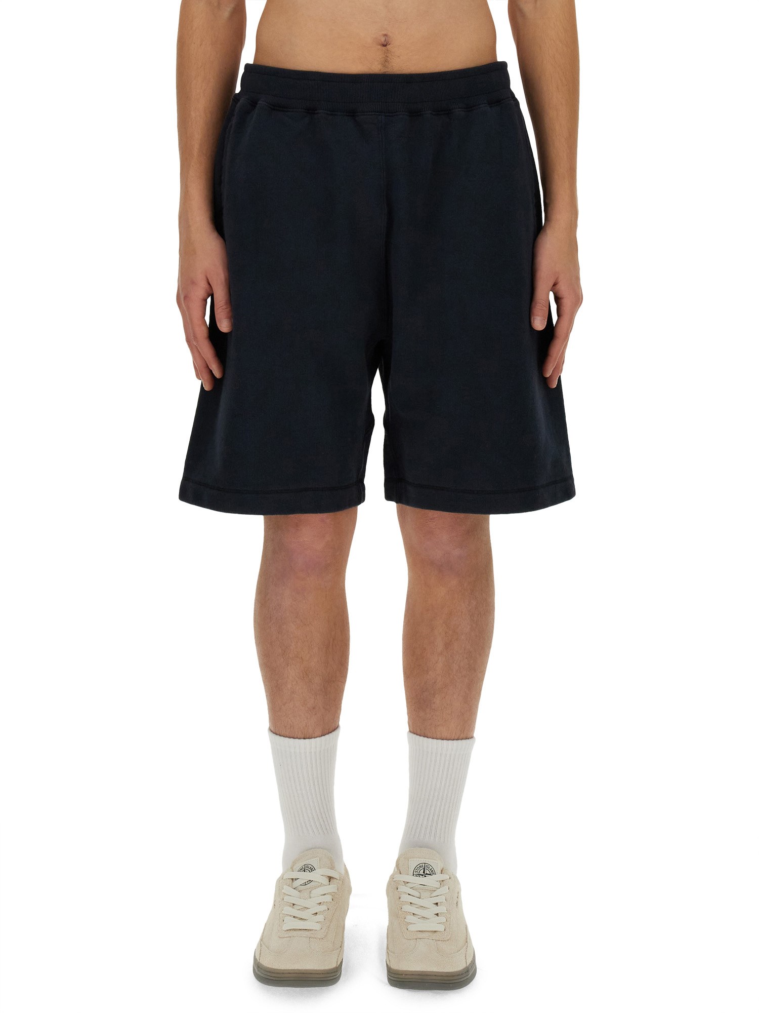 Shop Stone Island Sweat Shorts. In Blue