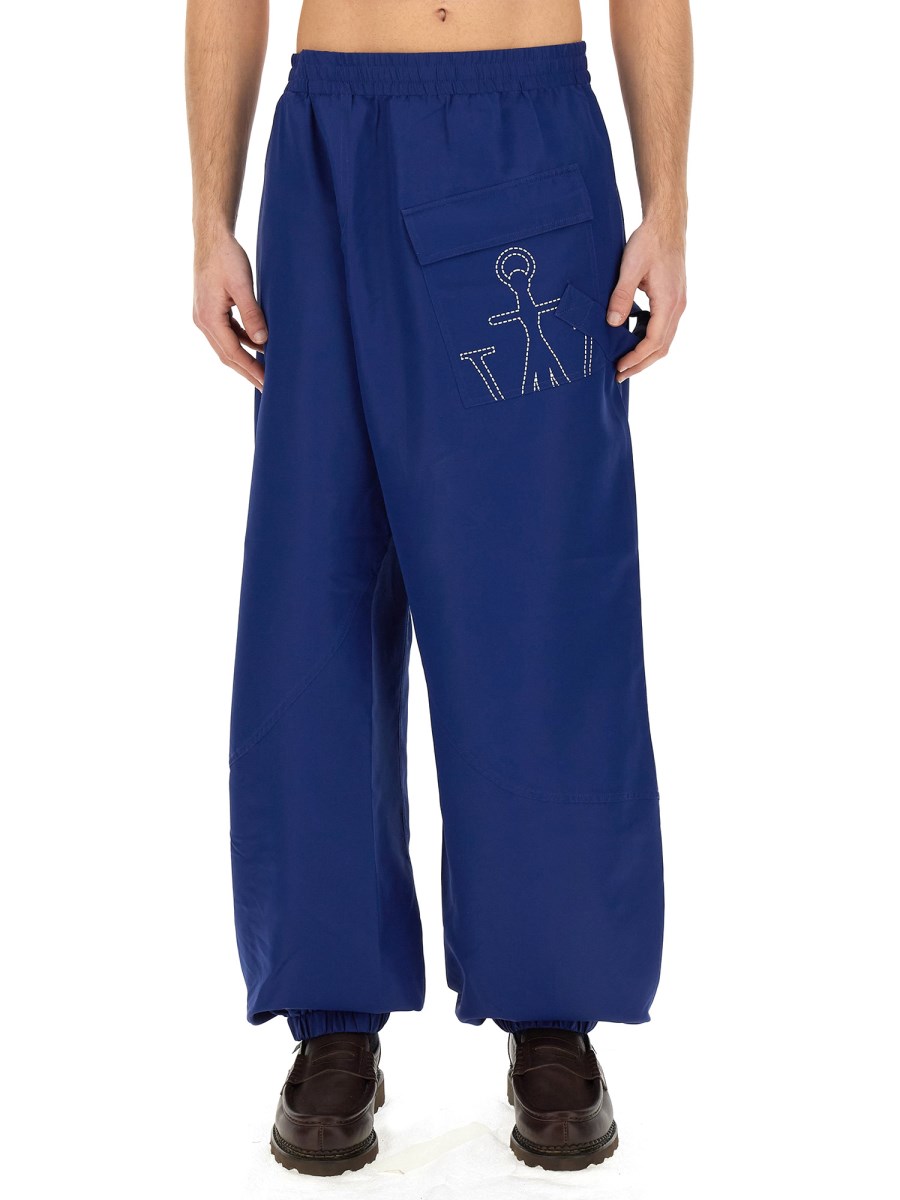 JW ANDERSON PANTALONE JOGGERS CON LOGO ANCORA