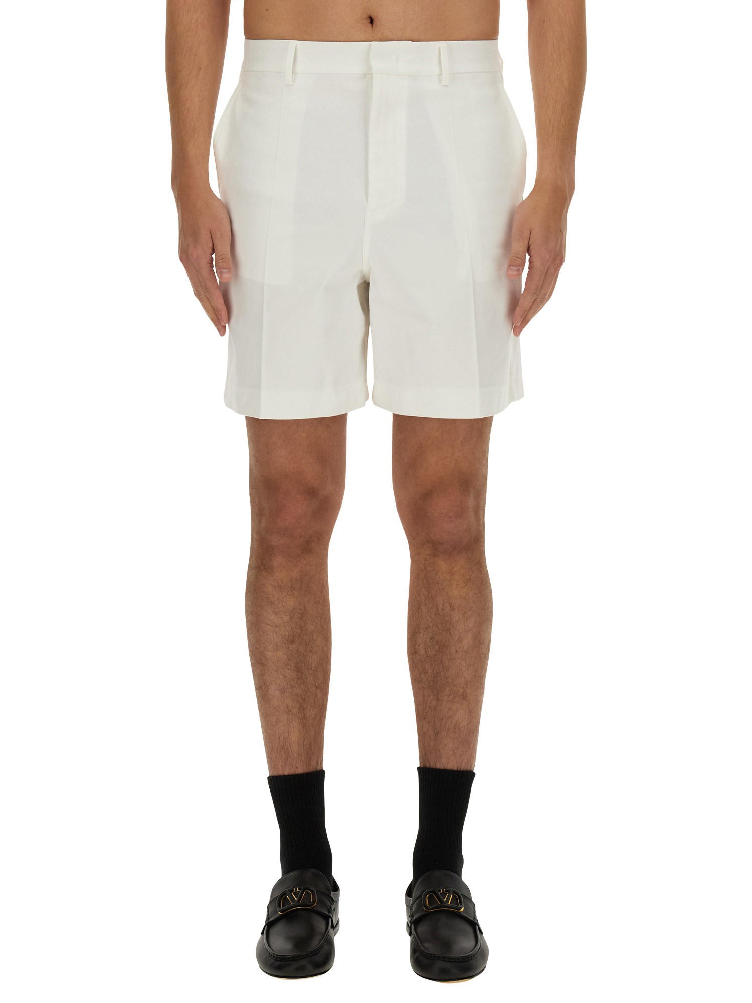 Shop Valentino Bermuda Shorts With Rubberized V Detail In Ivory