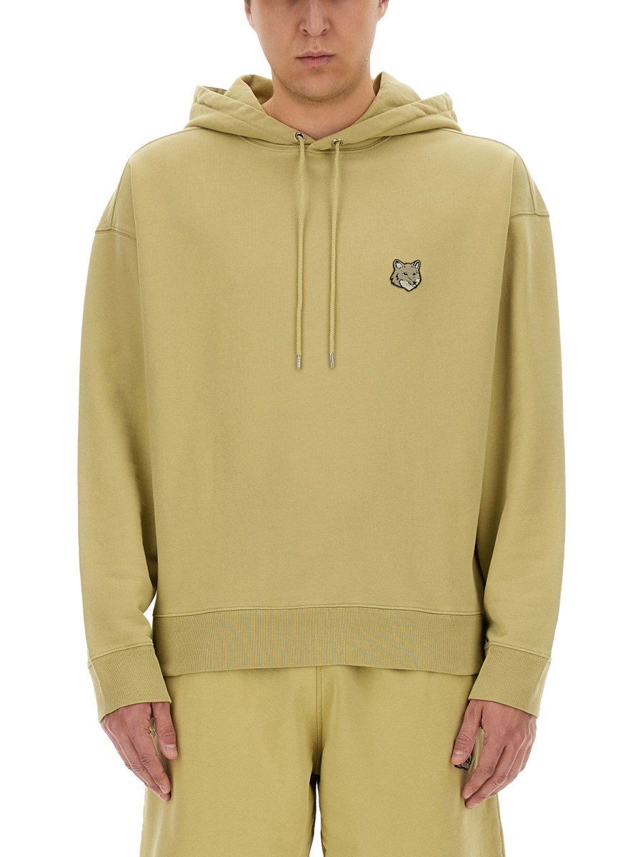 FELPA OVERSIZE CON CAPPUCCIO