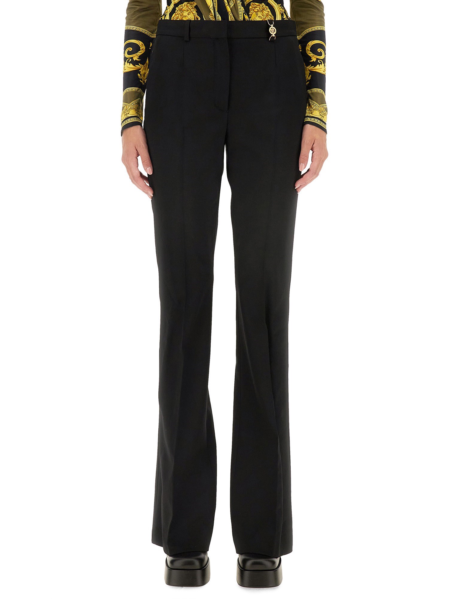 Shop Versace Slim Fit Pants In Black