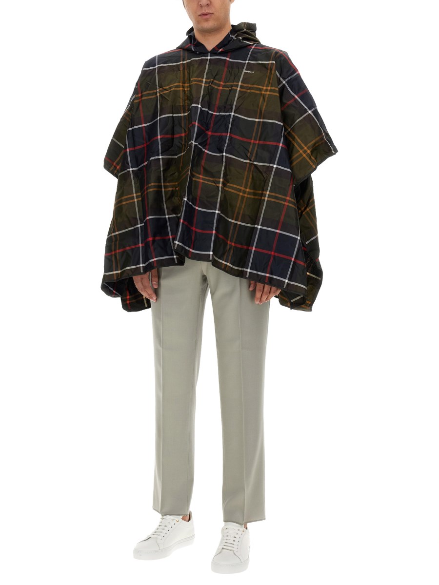 PONCHO CON MOTIVO TARTAN 