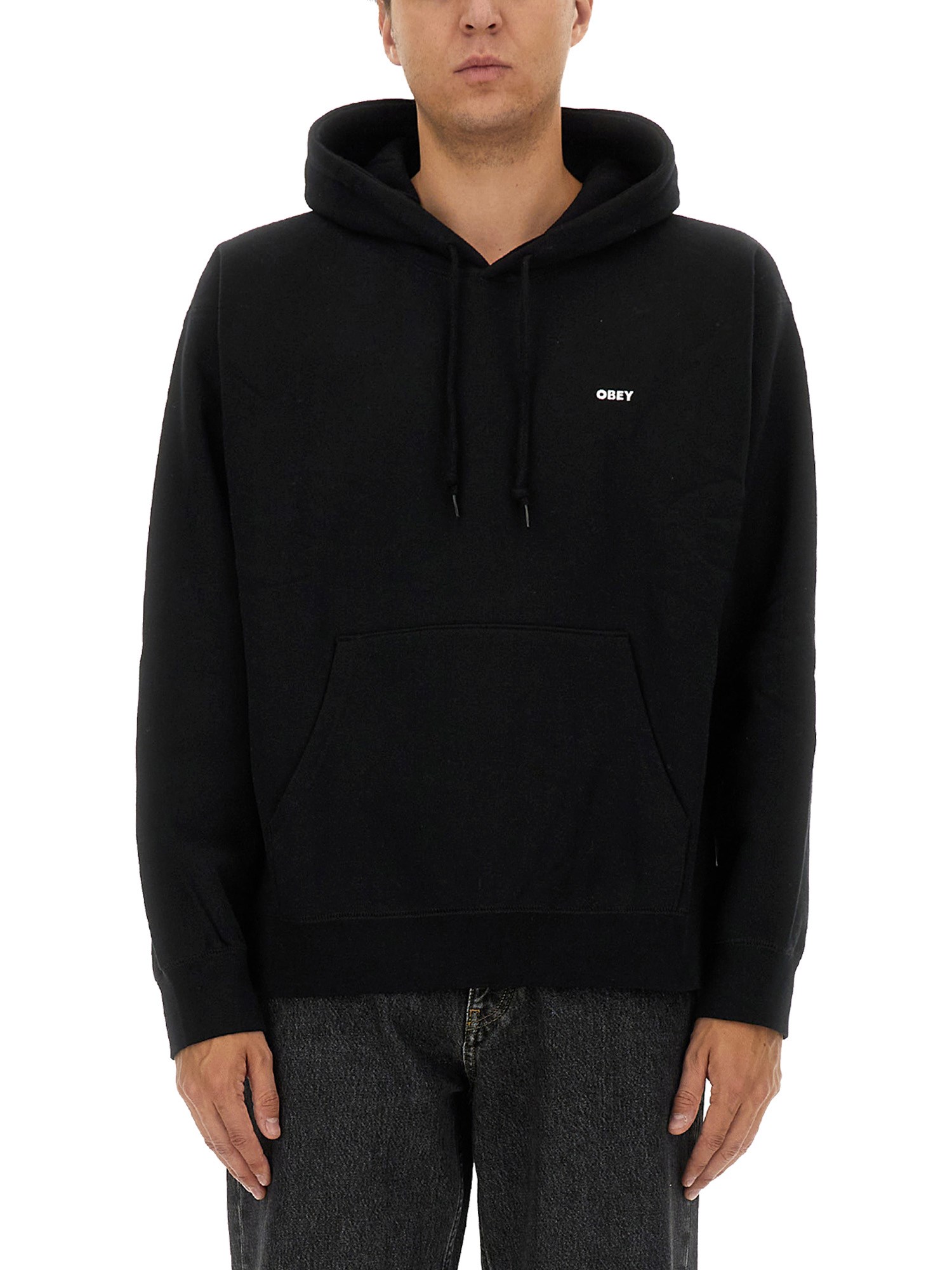 Shop Obey Hoodie In Black